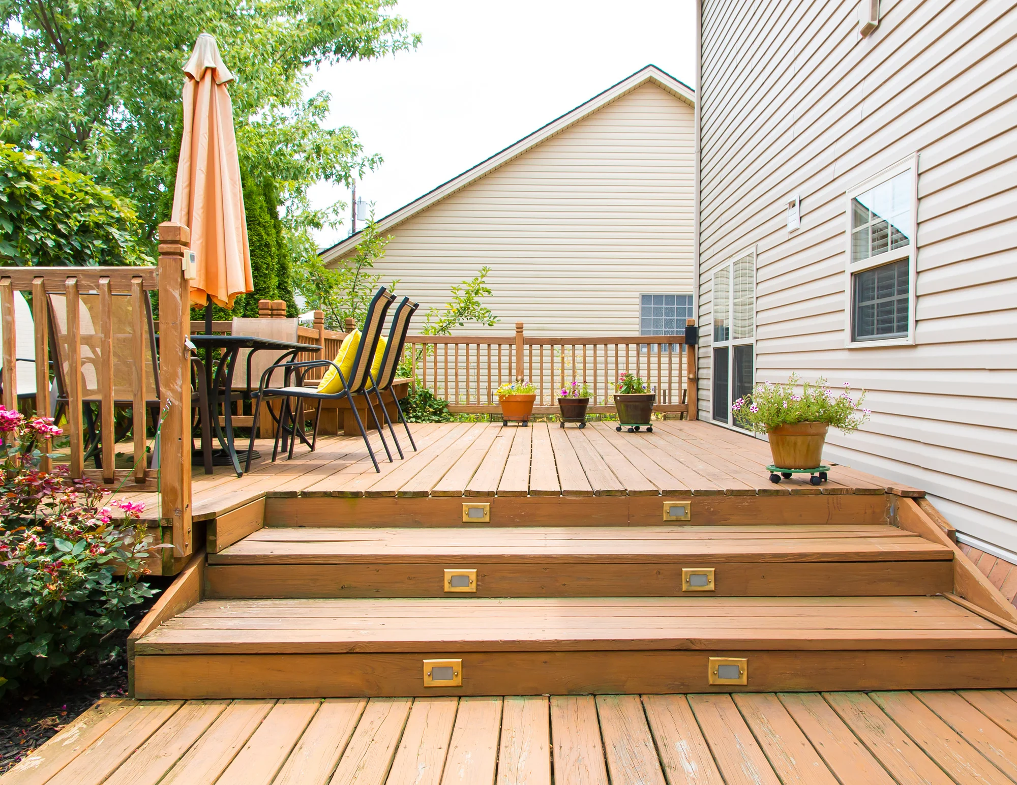 Outdoor renovation project including deck construction